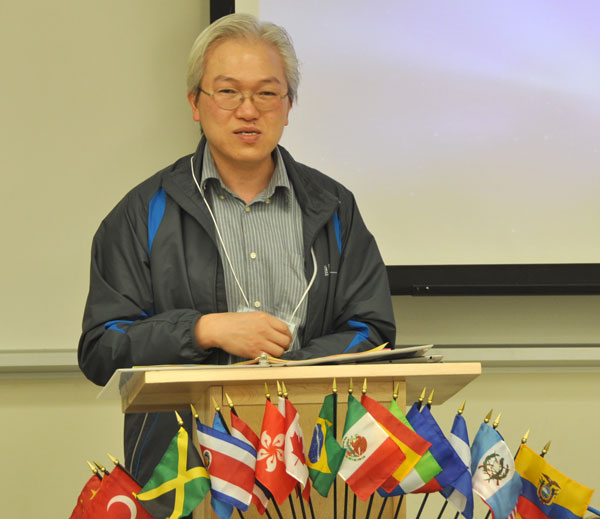 Rev. Yiu Kin Keung giving his report about the work of Hong Kong Conference during the past three years.