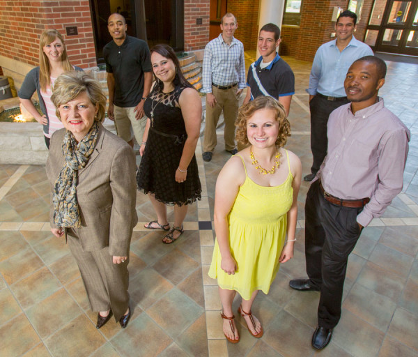Dr. Sherilyn Emberton (lower left) with Huntington University students.