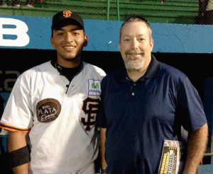 Jeff Dice with Jason Palacios, one of the professional players on the San Fernando team.