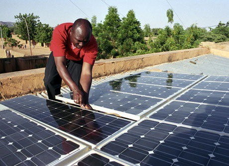 Maintaining the solar panels which power Radio Douentza. This radio station was opened in 1993 and broadcasts in local languages.
